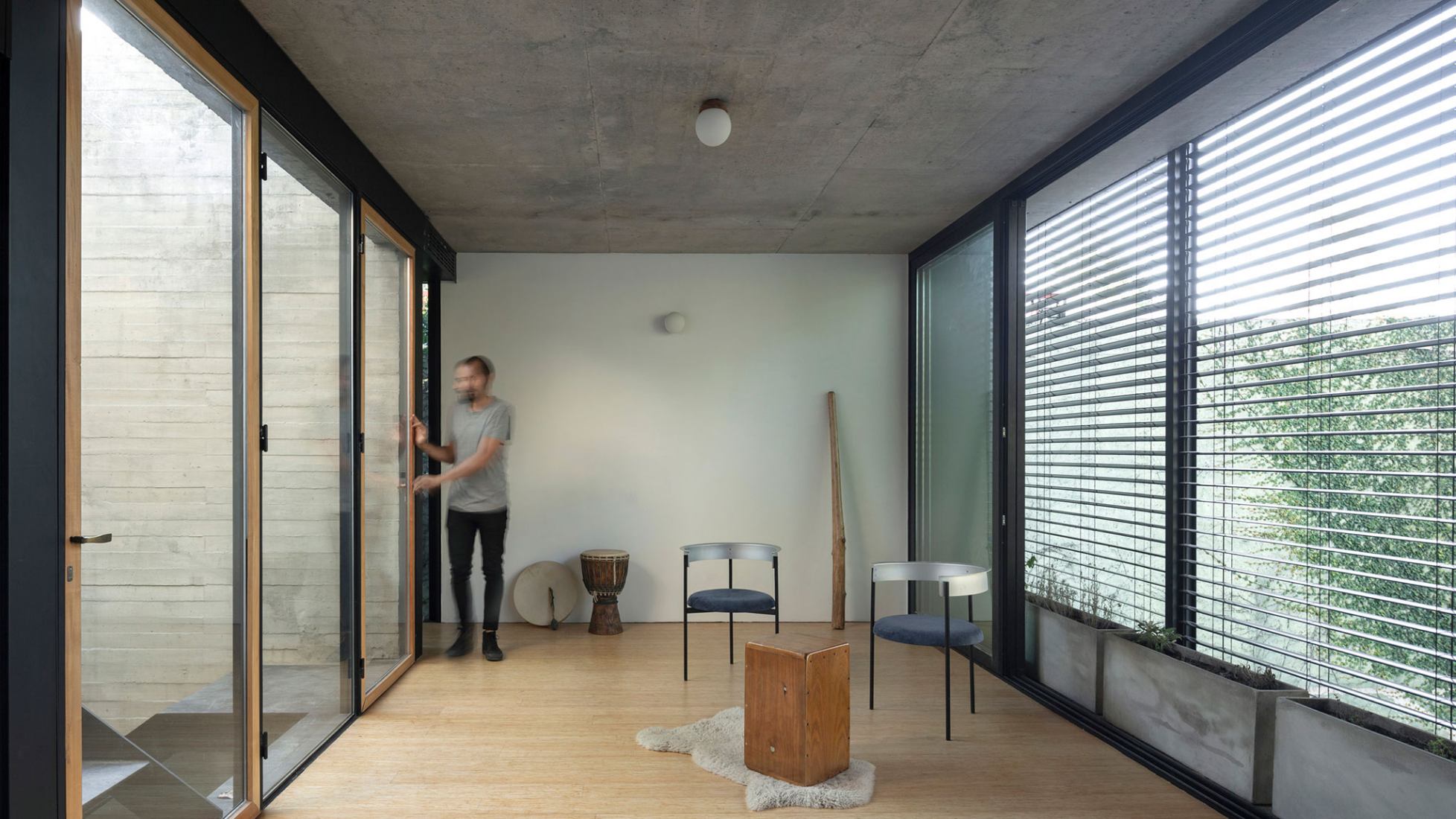 Dilute the boundaries to be permeable to the environment. ATO House by