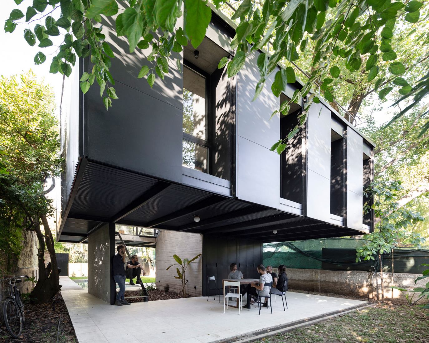 Dilute the boundaries to be permeable to the environment. ATO House by