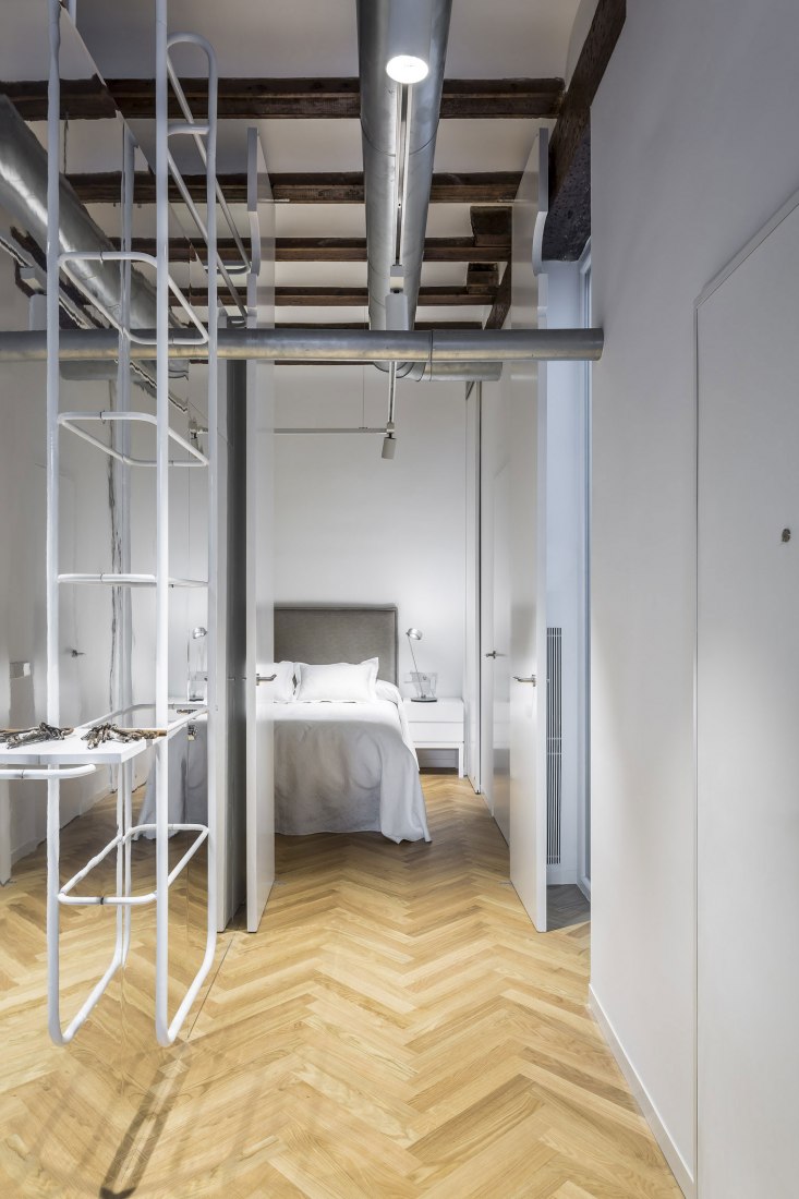 Stairs and room's door. "Cuentos: Late Night Tales" by Joaquín Juberías & Víctor Cano Ciborro. Photograph by German Cabo