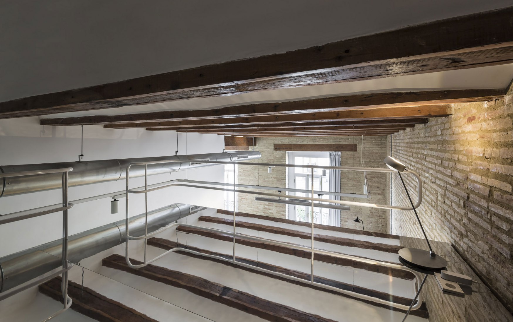 Attic. "Cuentos: Late Night Tales" by Joaquín Juberías & Víctor Cano Ciborro. Photograph by German Cabo