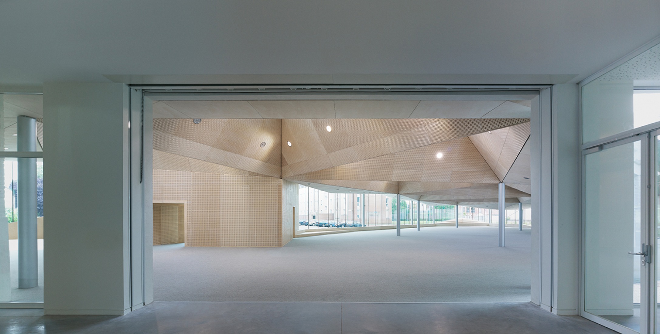 Interior view without forniture. Médiathèque La Madeleine by TANK. Photography © Julien Lanoo.