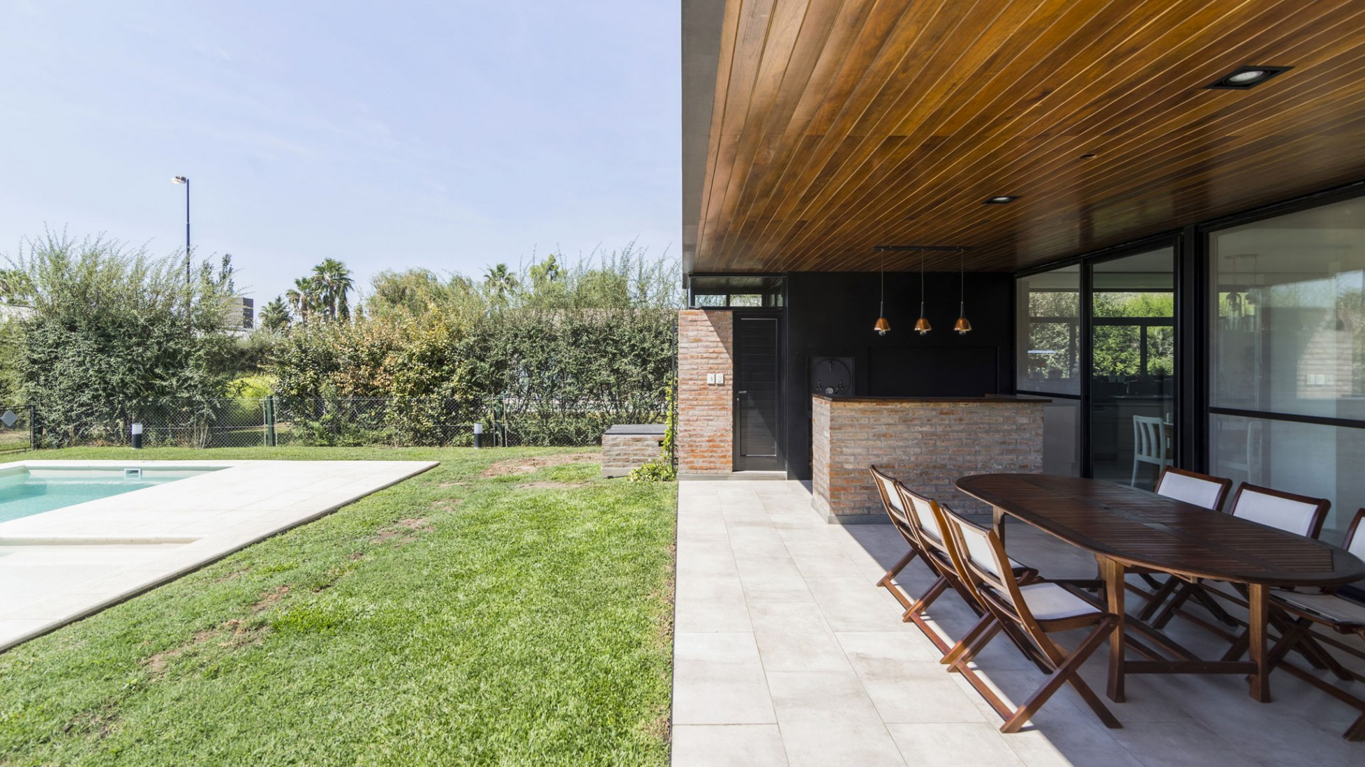 Porch. House in San Marino, Funes Hills by Mariel Suárez. Photograph by Ramiro Sosa