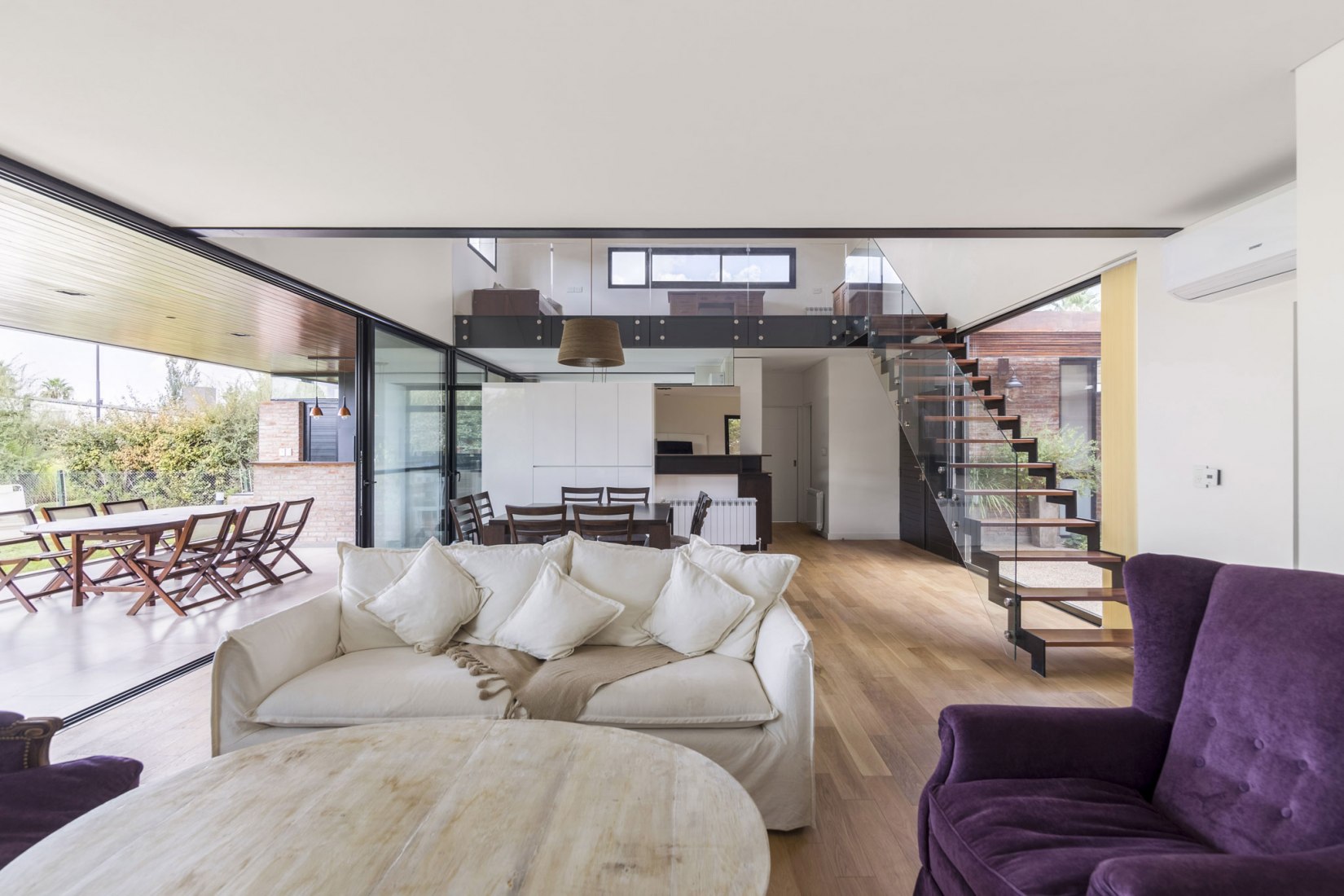 Livingroom. House in San Marino, Funes Hills by Mariel Suárez. Photograph by Ramiro Sosa