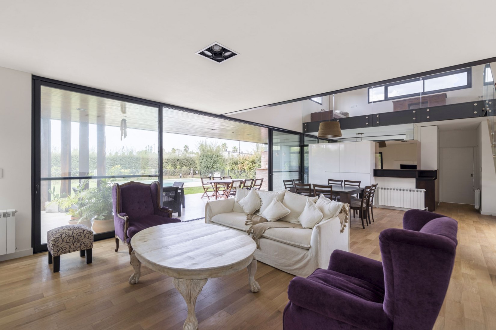 Livingroom. House in San Marino, Funes Hills by Mariel Suárez. Photograph by Ramiro Sosa