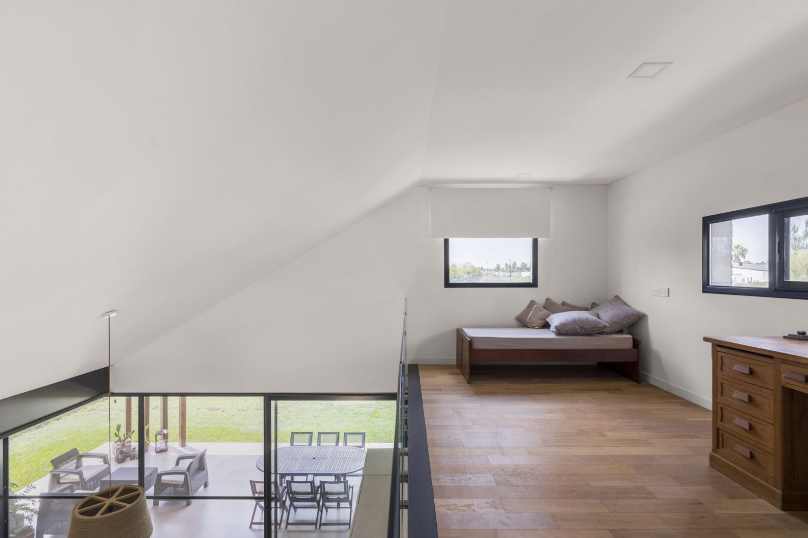 Attic. House in San Marino, Funes Hills by Mariel Suárez. Photograph by Ramiro Sosa