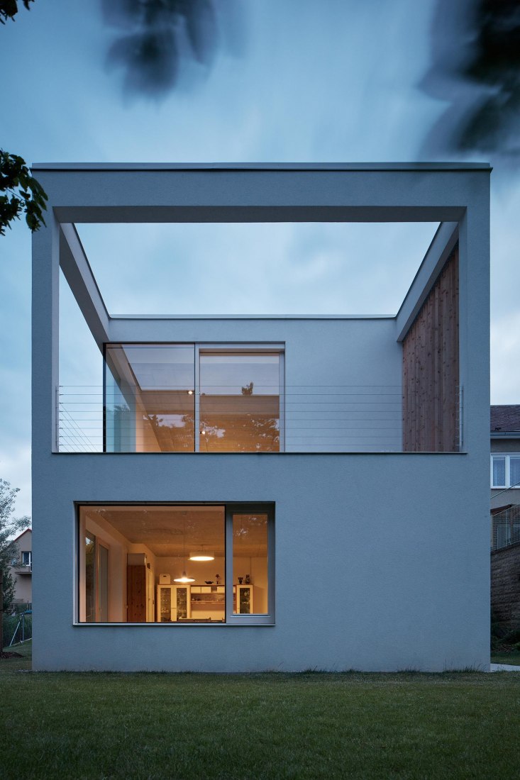 Exterior night view. Family House in the Slope by masparti / pavel martinka, ondřej spusta. Photograph by Jakub Skokan, Martin Tůma / BoysPlayNice