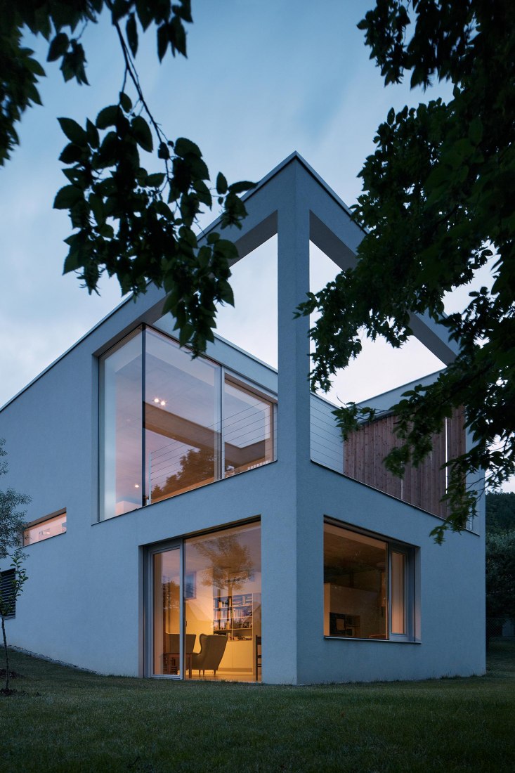 Exterior night view. Family House in the Slope by masparti / pavel martinka, ondřej spusta. Photograph by Jakub Skokan, Martin Tůma / BoysPlayNice