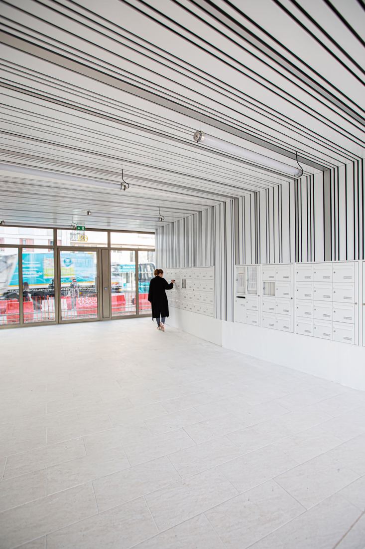 Complejo residencial Bourg-La-Reine por Margot-Duclot Architectes Associés. Fotografía por Charlotte Bommelaer.
