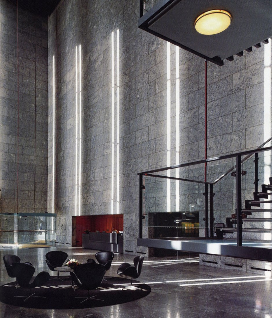 Staircase of the National Bank of Denmark, designed by Arne Jacobsen, in the middle of Copenhagen, between 1966 and 1978. Image courtesy of National Bank of Denmark