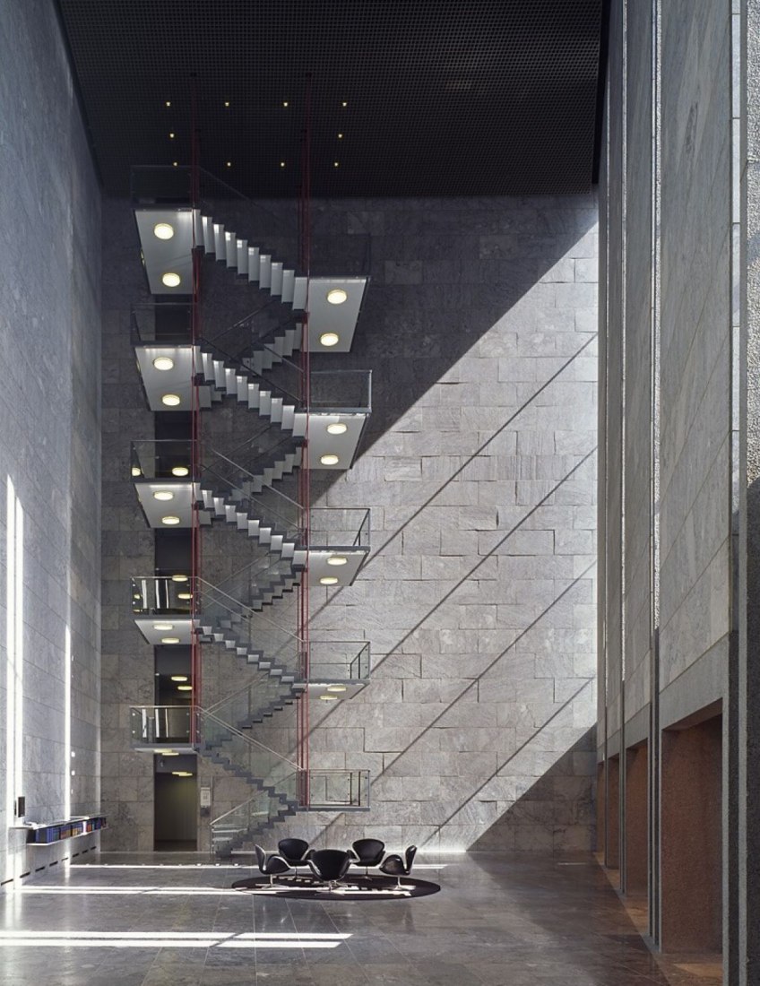 Staircase of the National Bank of Denmark, designed by Arne Jacobsen, in the middle of Copenhagen, between 1966 and 1978. Image courtesy of National Bank of Denmark