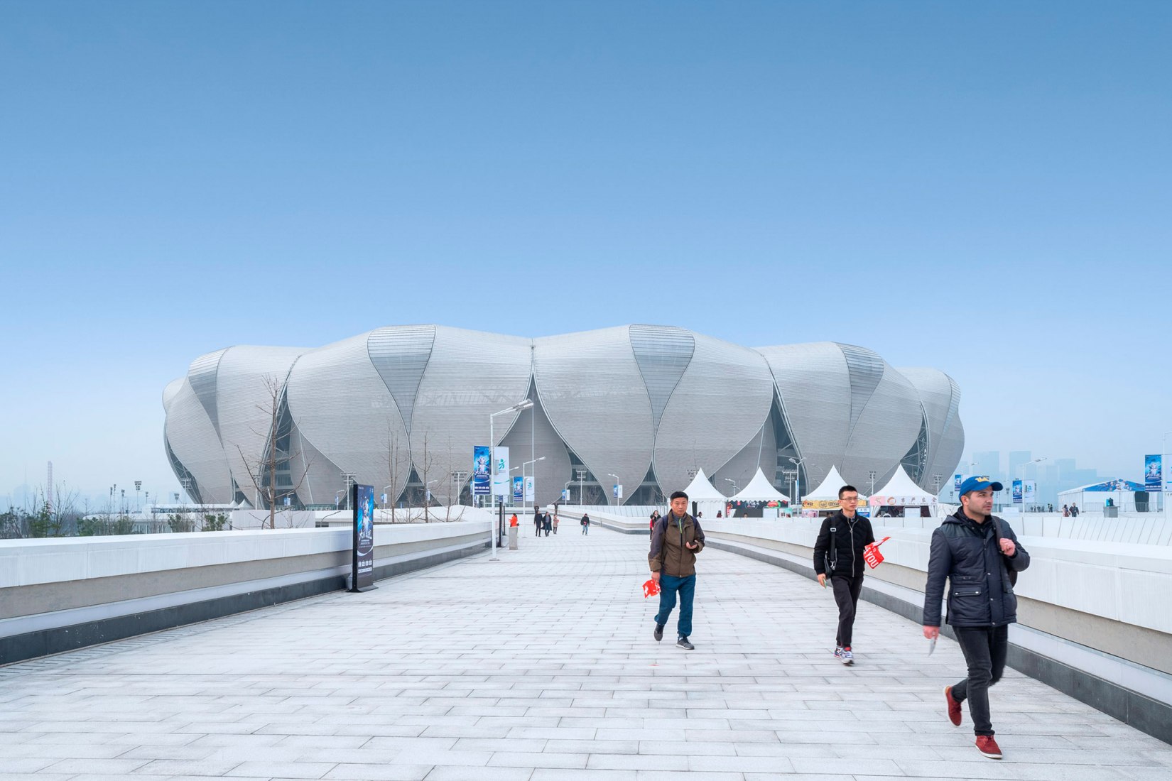 Complejo Deportivo Olímpico de Hangzhou por NBBJ. Fotografía por Shao Feng