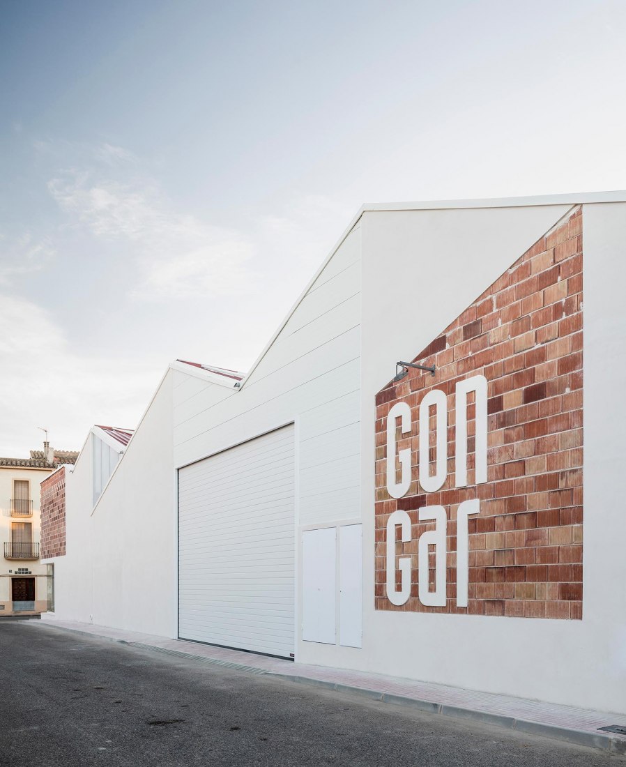 Exterior view. Rehabilitation and expansion of the Gon-Gar Workshops by NUA arquitectures. Photograph © Adriá Goula