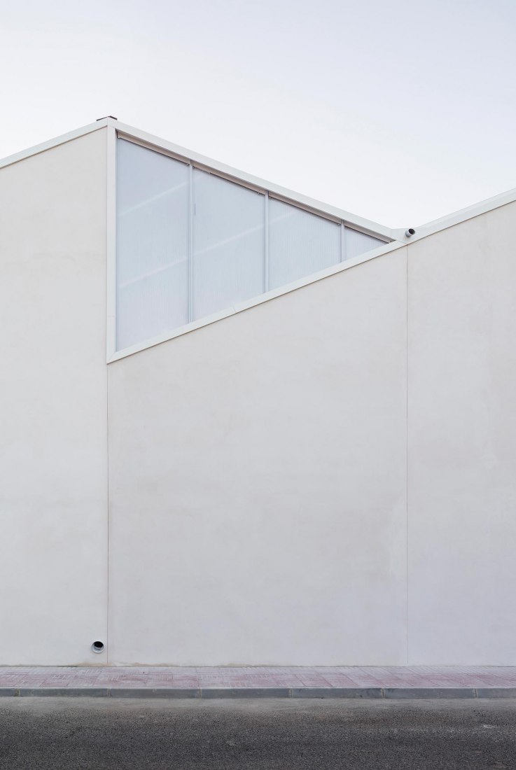 Facade detail. Rehabilitation and expansion of the Gon-Gar Workshops by NUA arquitectures. Photograph © Adriá Goula