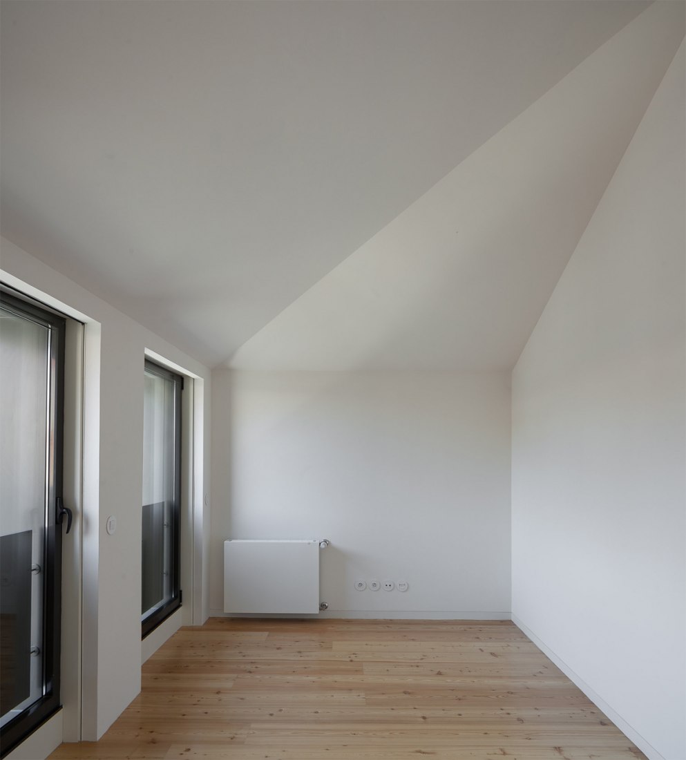 Boavista House by Pablo Pita Architects. Interior view of the social space.Photograph © José Campos.