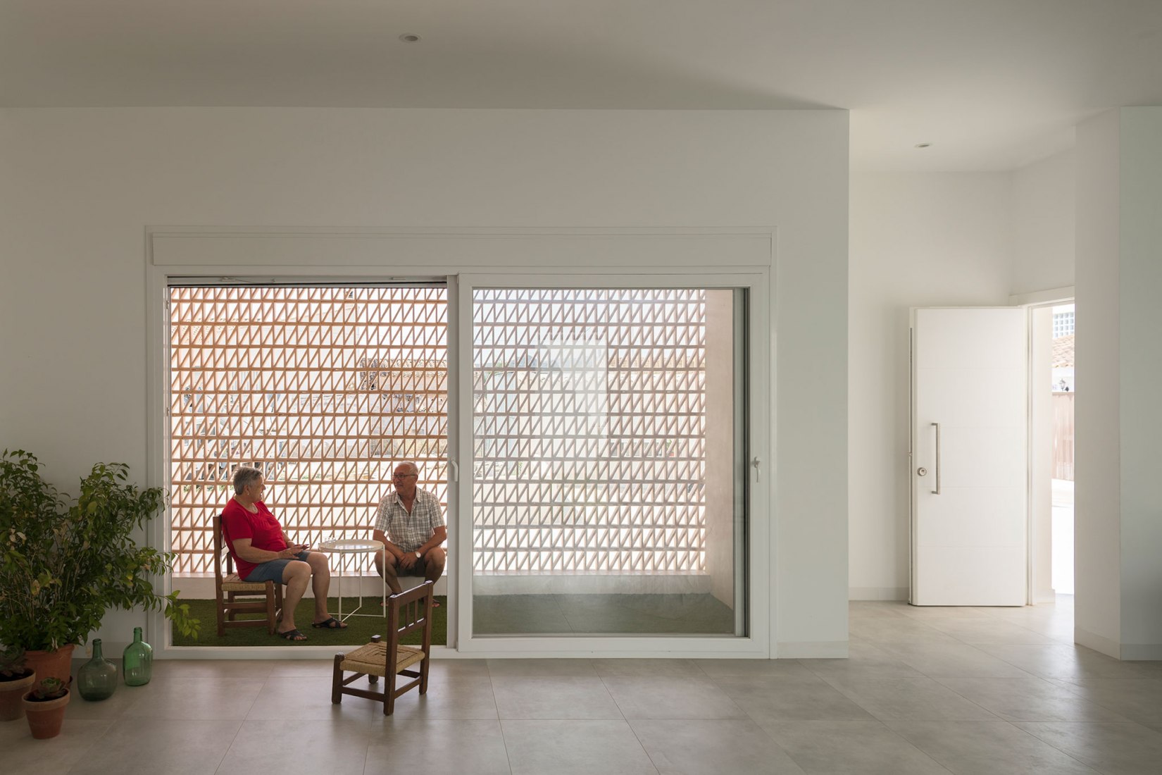 Vivienda en torno a una «era» por Palera arquitectos. Fotografía por Milena Villalba