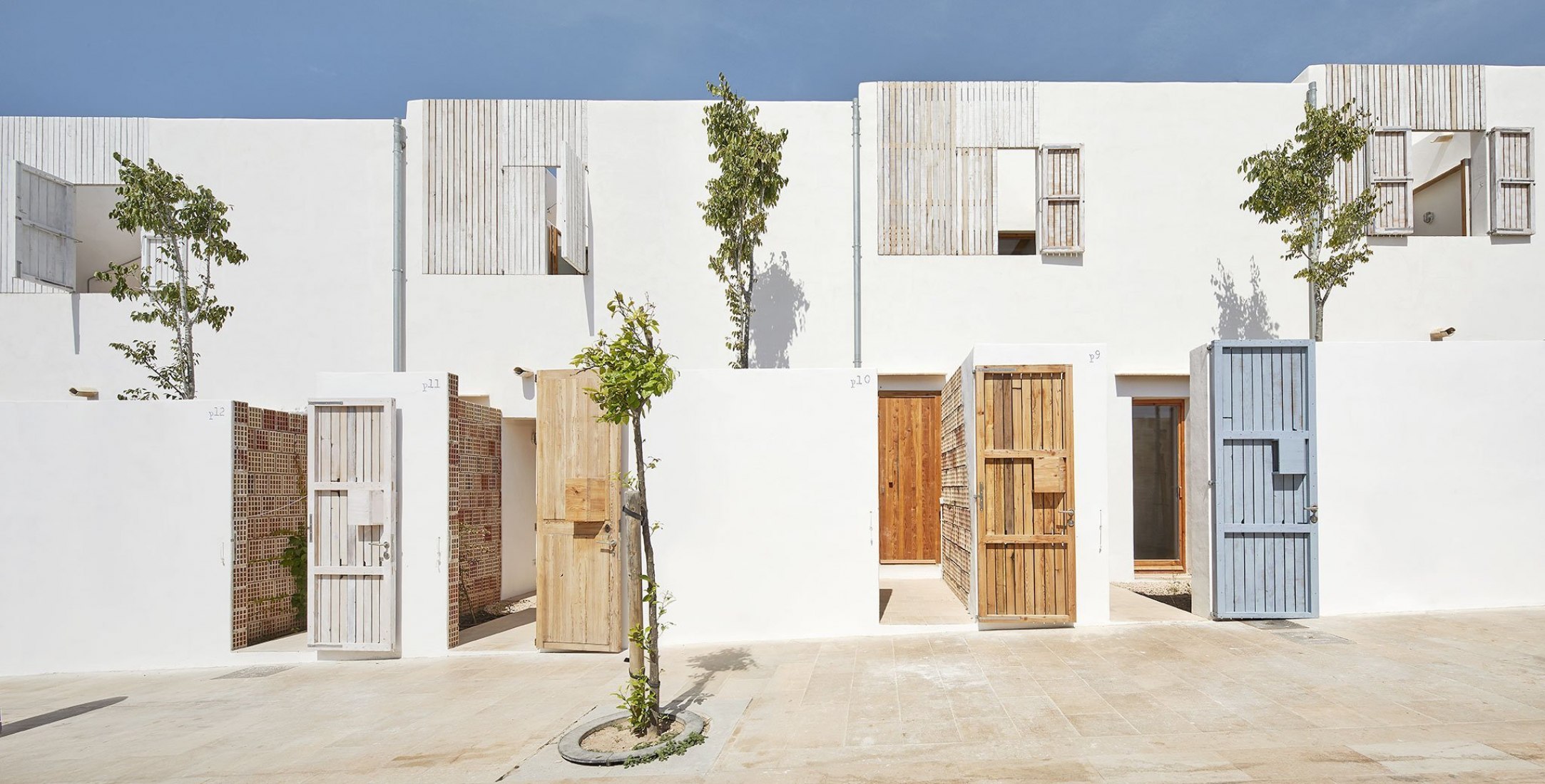 Exterior view. Social housing in Formentera. Climate Change Adaptation project funded by the European Union. Photograph by José Hevia