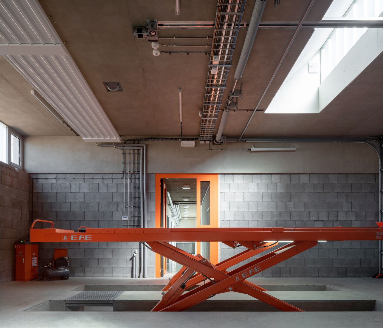 Technical Services Base Lysolaje by Progres architekti. Photogragph by Alex Shoots Buildings.