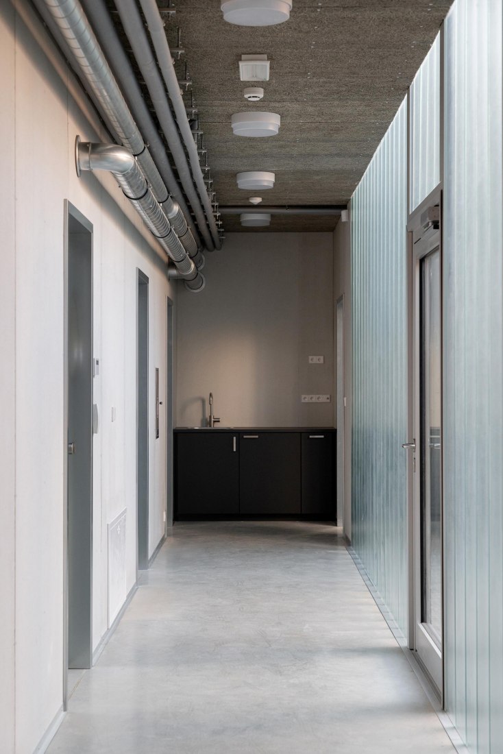 Technical Services Base Lysolaje by Progres architekti. Photogragph by Alex Shoots Buildings.