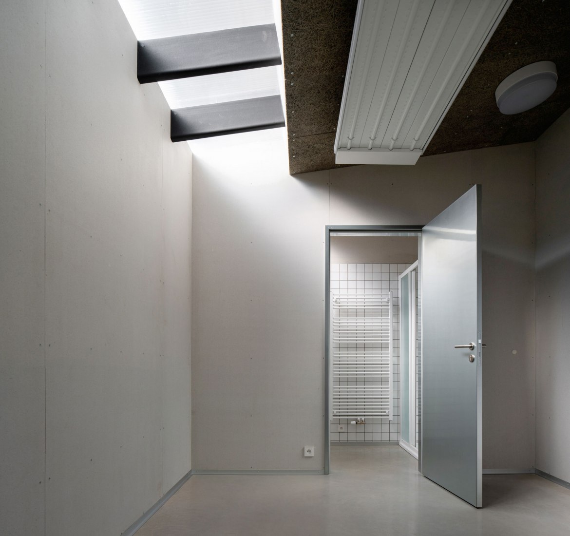 Technical Services Base Lysolaje by Progres architekti. Photogragph by Alex Shoots Buildings.