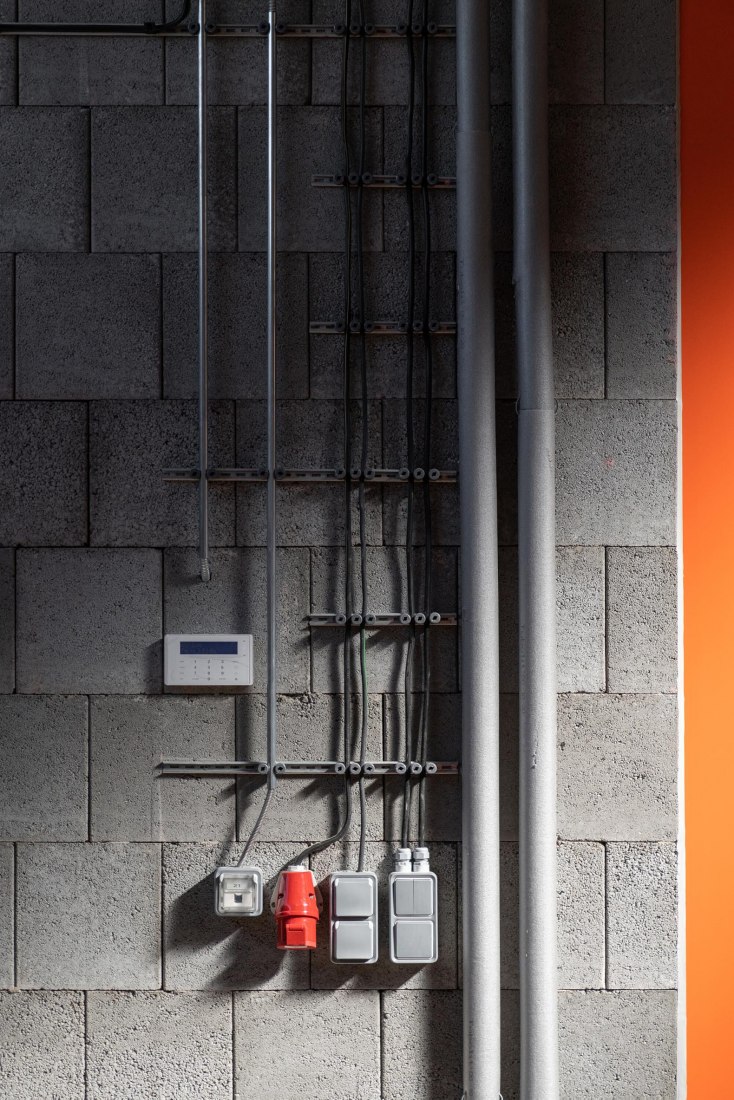 Technical Services Base Lysolaje by Progres architekti. Photogragph by Alex Shoots Buildings.