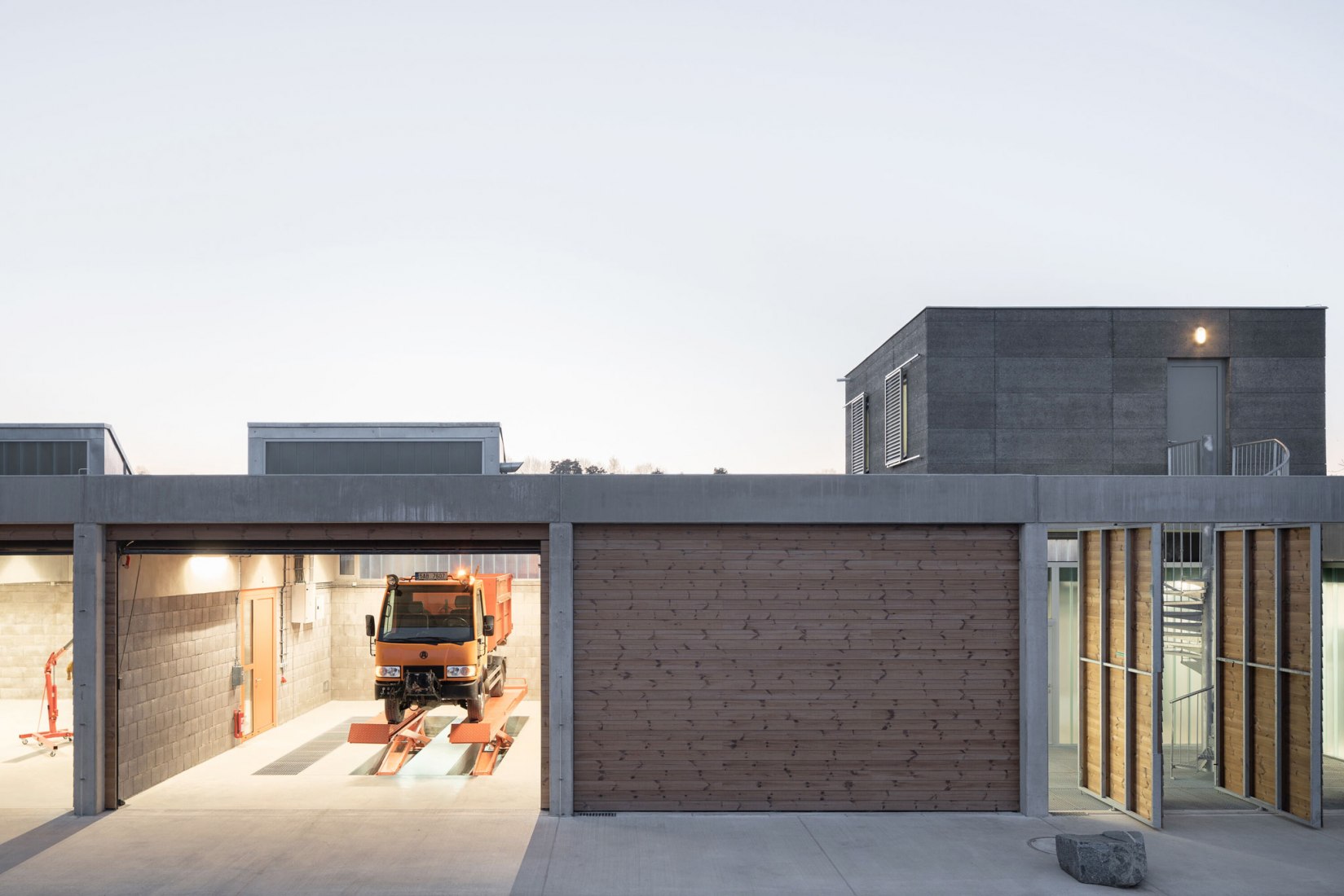 Technical Services Base Lysolaje by Progres architekti. Photogragph by Alex Shoots Buildings.