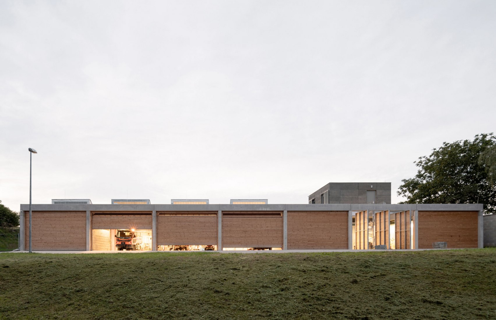 Technical Services Base Lysolaje by Progres architekti. Photogragph by Alex Shoots Buildings.