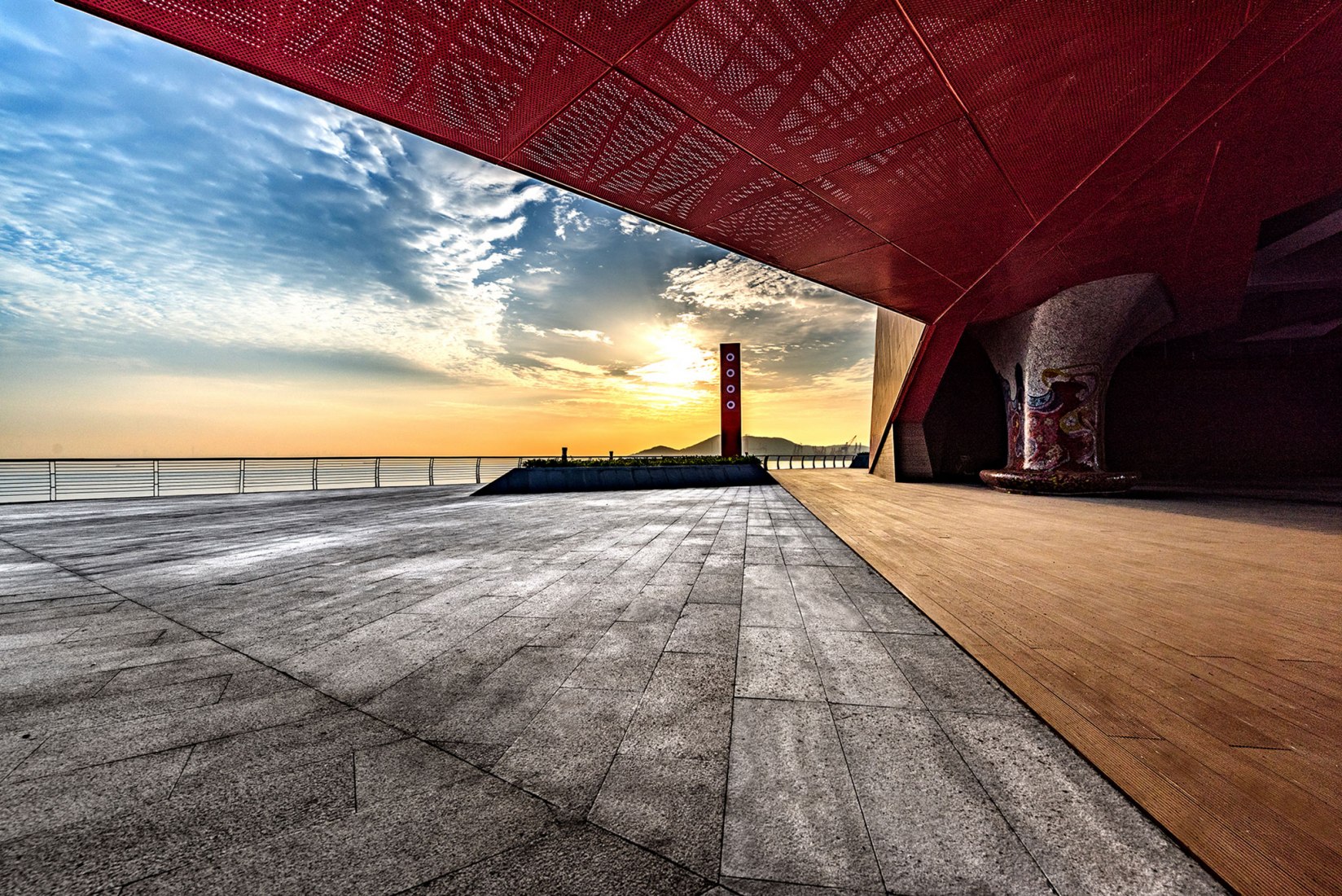 Atardecer. Qingdao Wanda Victoria Bay Xifeng Bridge por PT Architecture Design. Fotografía © PT Landscape
