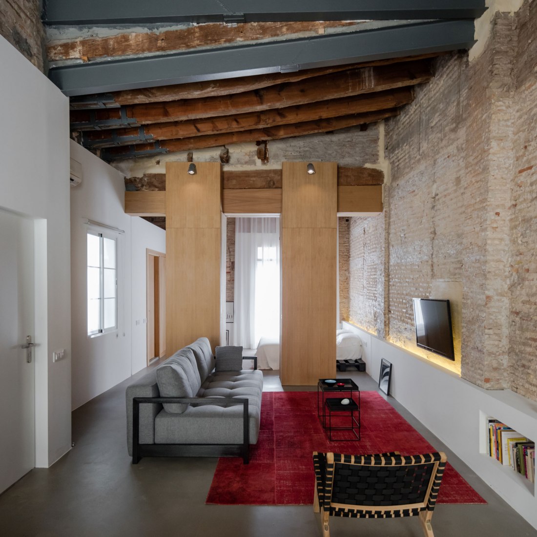 Linving room. Apartment Musico Iturbi by Roberto di Donato Architecture. Photograph © Joao Morgado