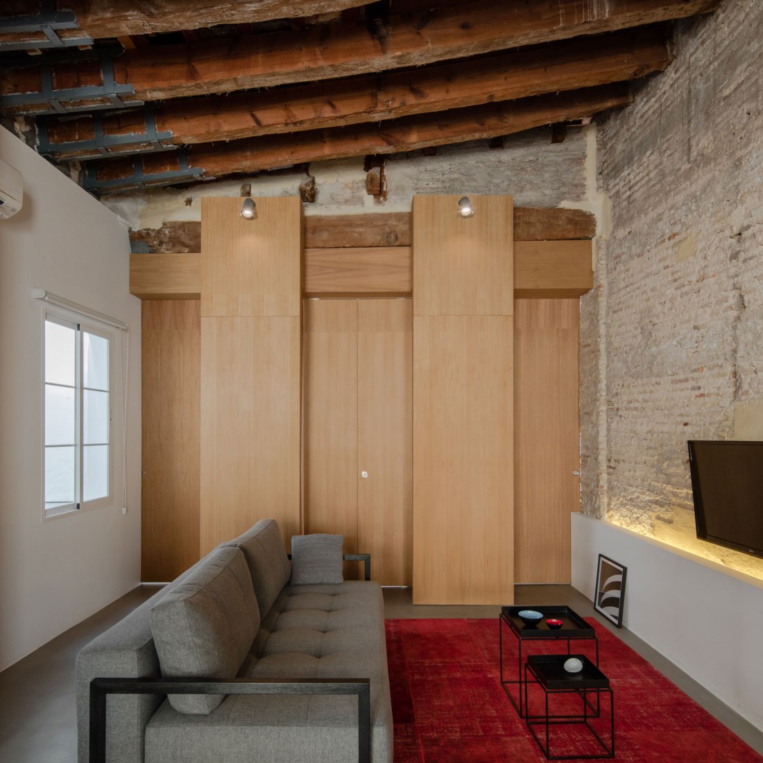 Linving room. Apartment Musico Iturbi by Roberto di Donato Architecture. Photograph © Joao Morgado