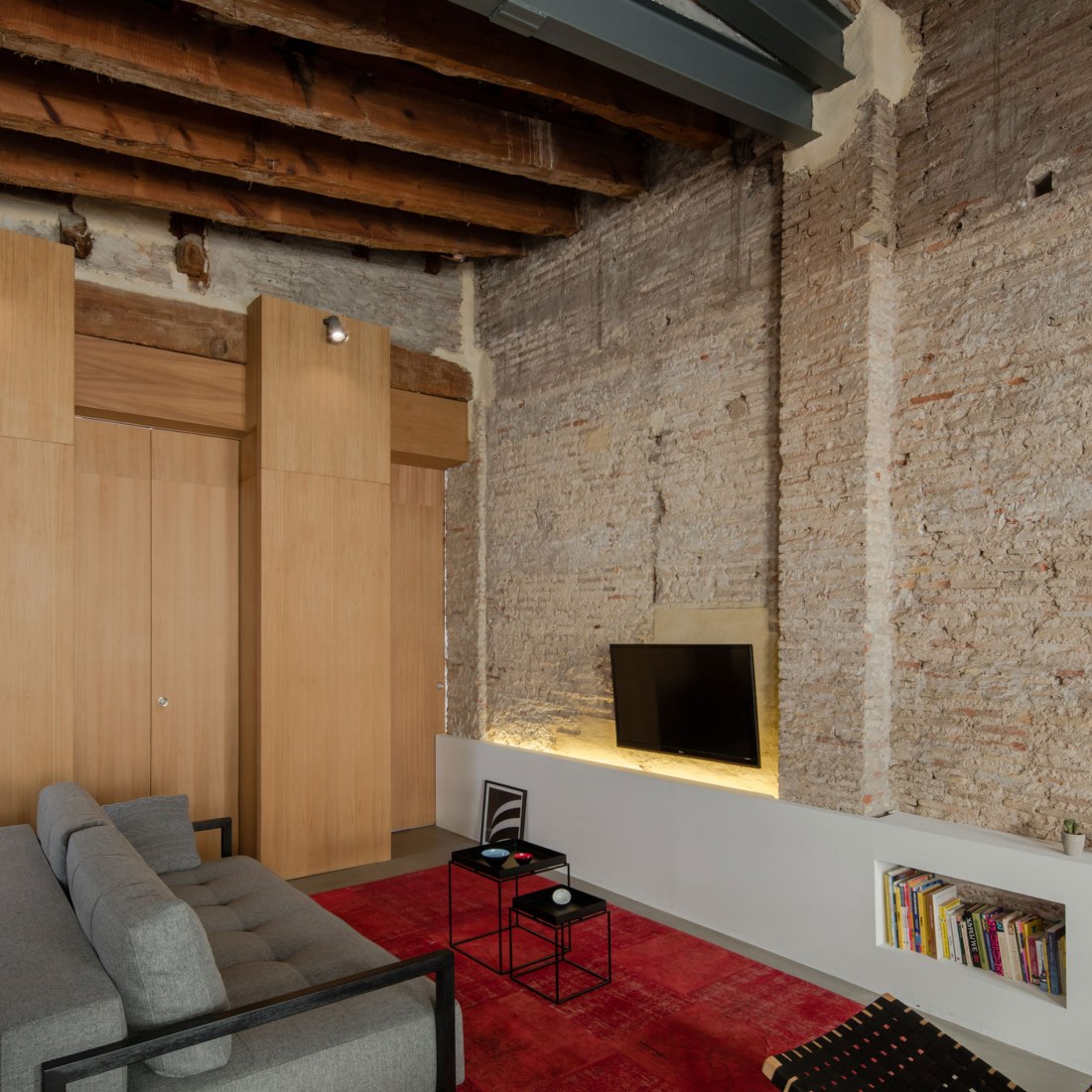 Linving room. Apartment Musico Iturbi by Roberto di Donato Architecture. Photograph © Joao Morgado