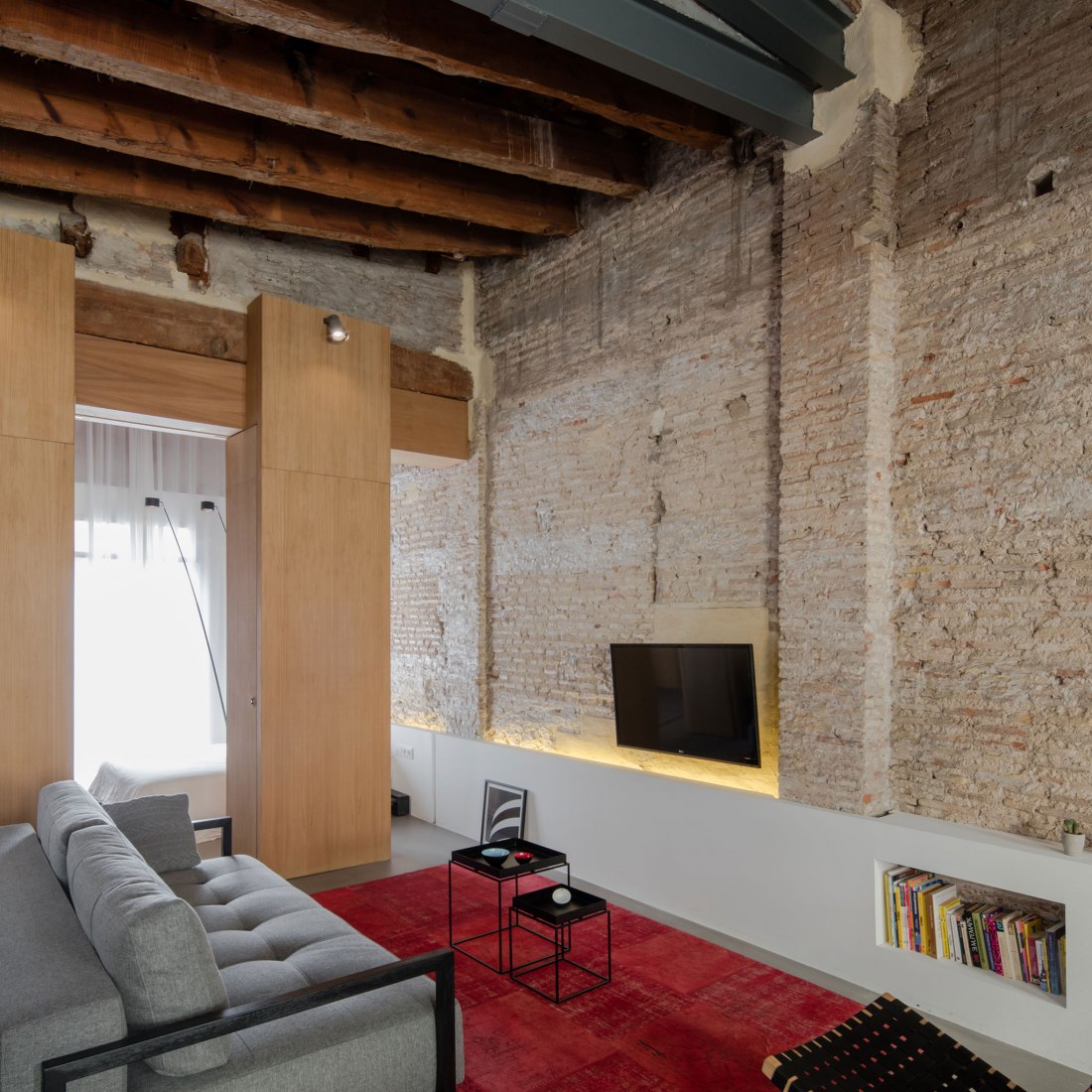 Linving room. Apartment Musico Iturbi by Roberto di Donato Architecture. Photograph © Joao Morgado