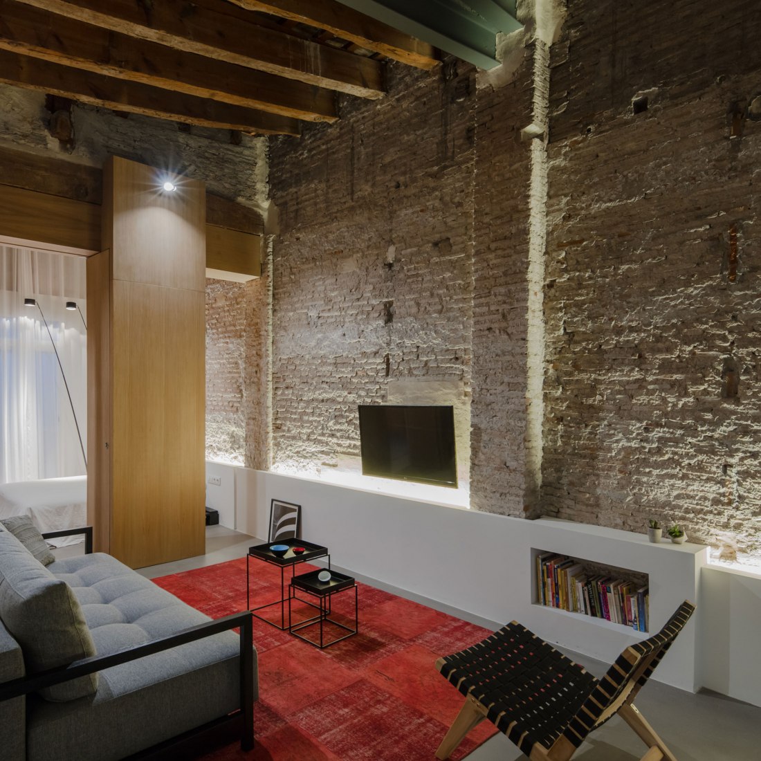 Night view. Apartment Musico Iturbi by Roberto di Donato Architecture. Photograph © Joao Morgado