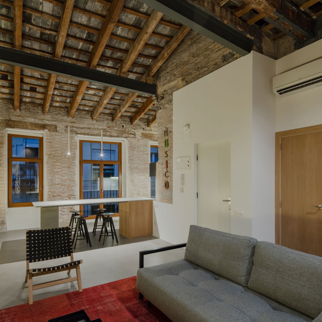 Night view. Apartment Musico Iturbi by Roberto di Donato Architecture. Photograph © Joao Morgado