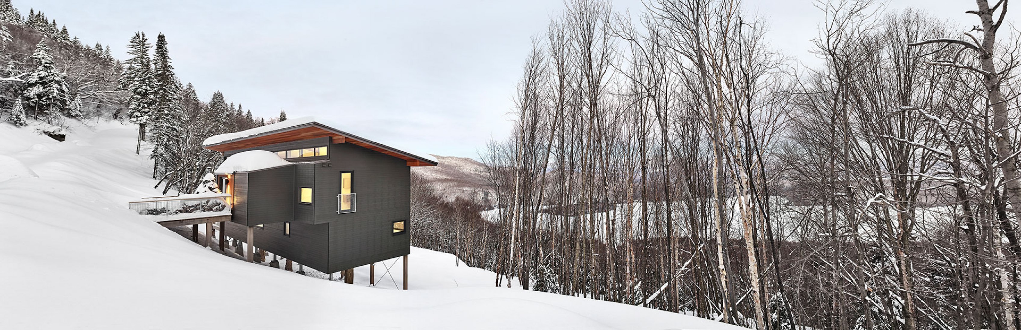 Outside view. Laurentian Ski Chalet by RobitailleCurtis. Photograph by Marc Cramer.