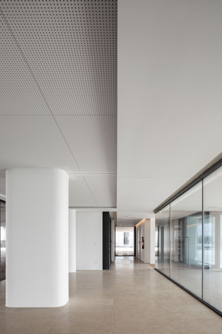 ORIZZONT Building by Rvdm Arquitectos. Photograph by Ivo Tavares Studio.
