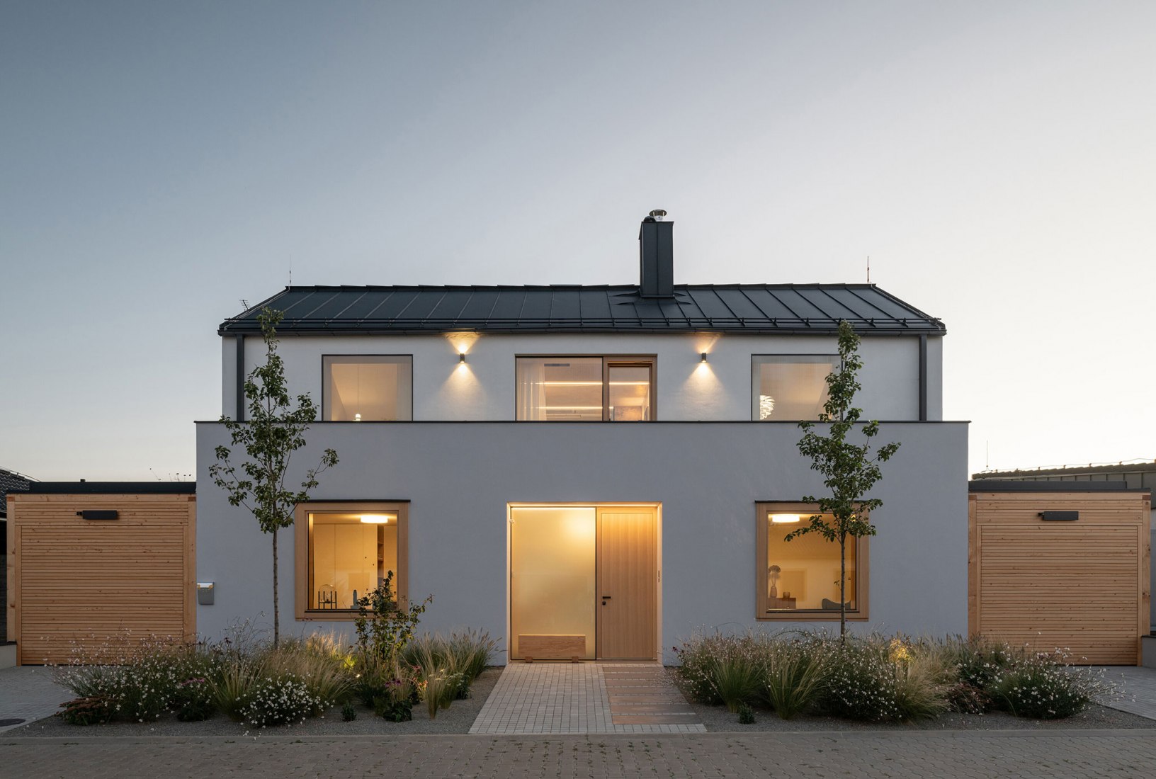 Family House With Atrium by SENAA architekti. Photograph by Alex Shoots Buildings
