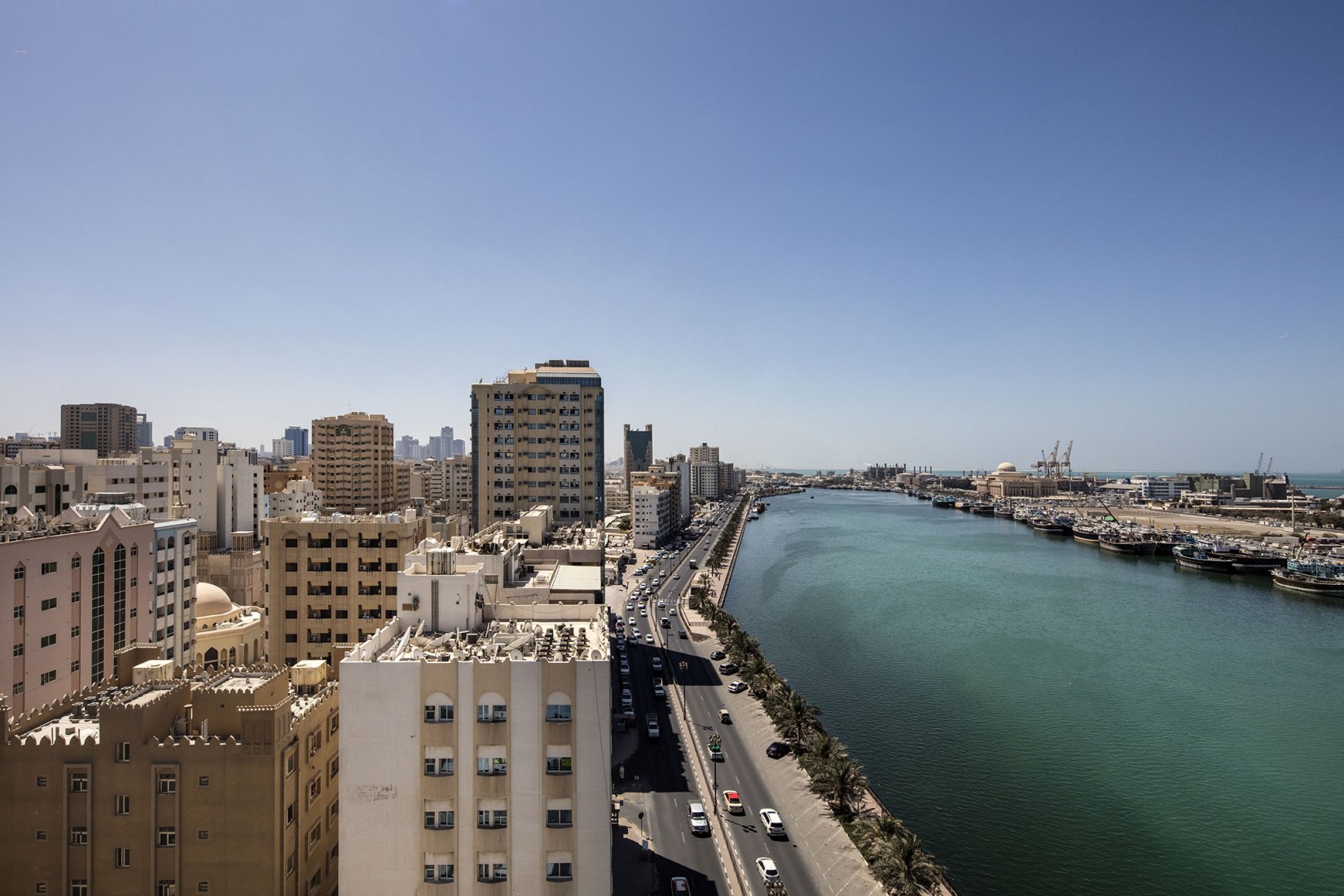 Aerial view of Khalid Port and Al Mujarrah neighborhood, Sharjah.Sharjah Architecture Triennial: the first international platform on architecture in the MENASA region. Photograph by Ieva Saudargaite