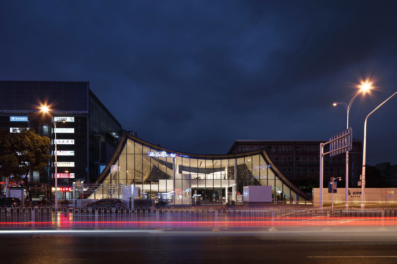 Front elevation, night view. SINO-OCEAN. Oriental Worldview Sales Center. Photograph by Yuchen Chao. Copyright by Waterfrom Design 