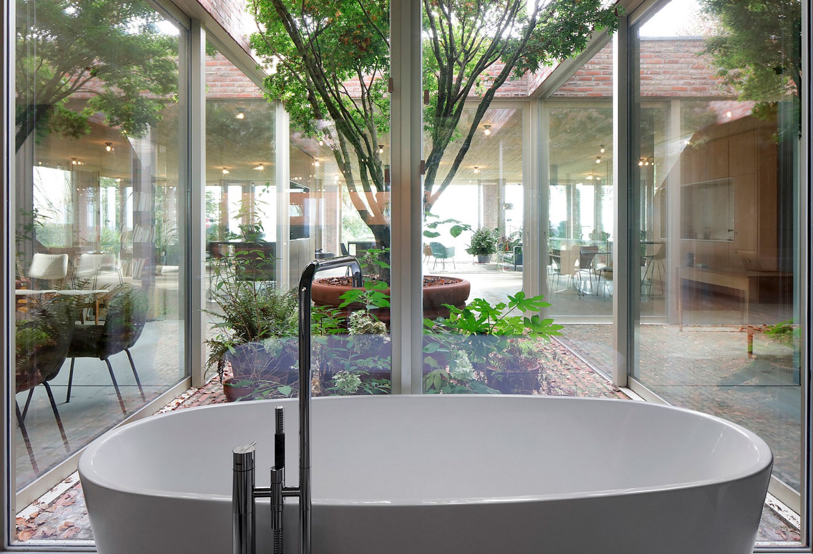 Studio Okami Looking landscape. Sloped Villa in a Belgian hillside by Studio Okami ...