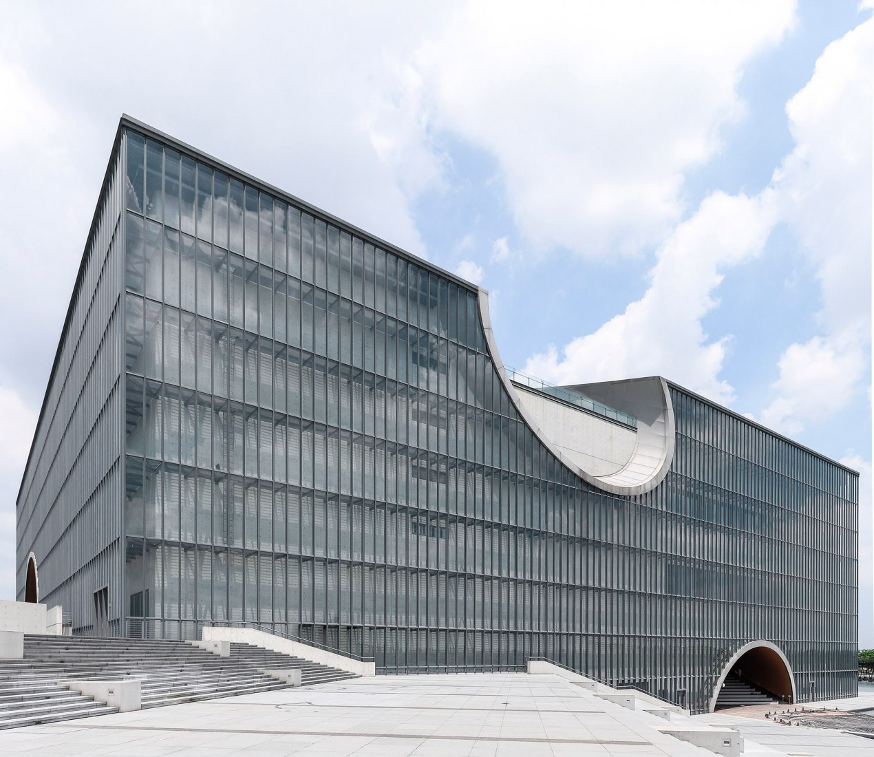 Shanghai Poly Grand Theatre. Tadao Ando's concrete and glass captured ...