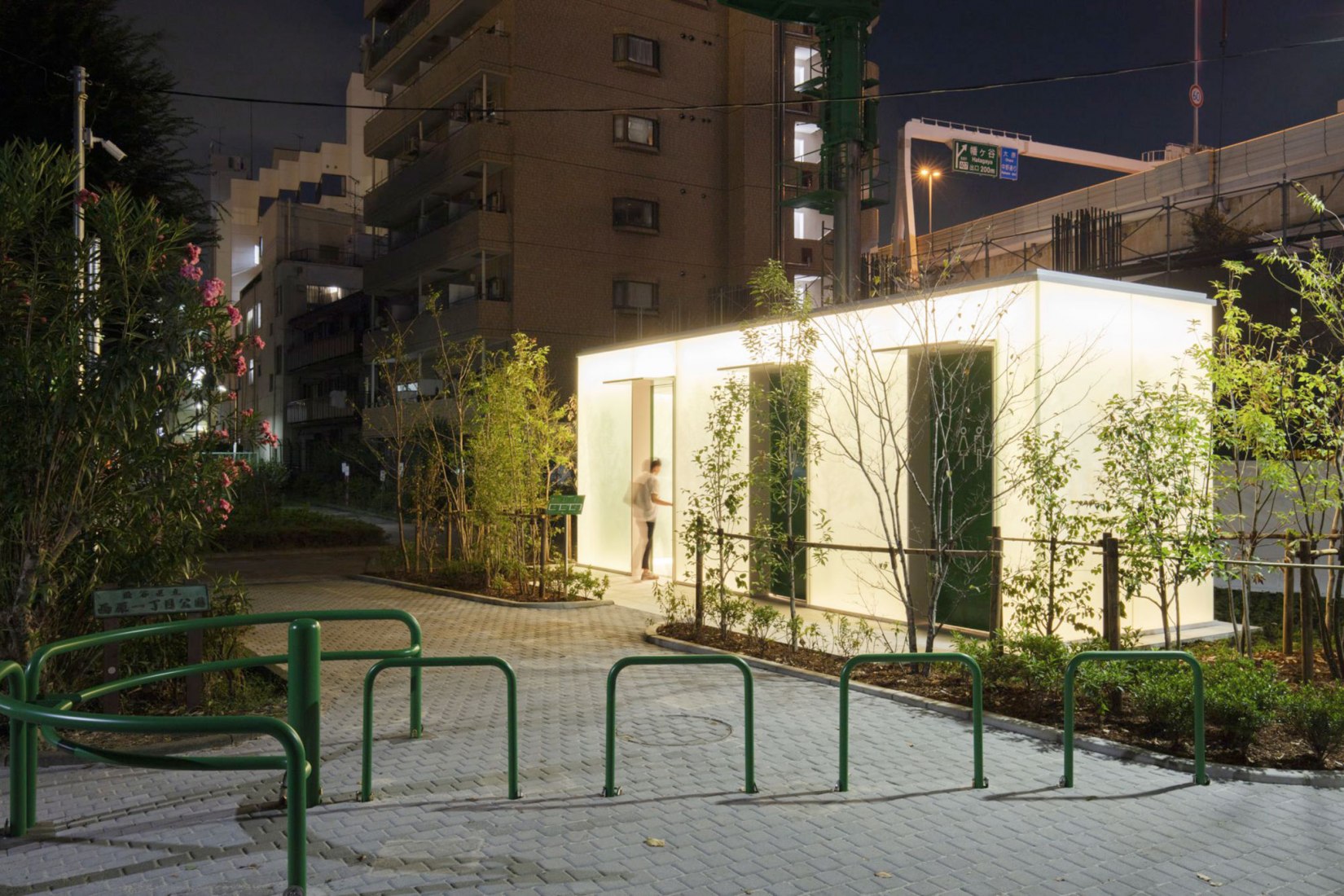 Gentle light illuminates the area. Andon Toilet. Toilet in Nishihara Itchome Park by Takenosuke Sakakura. Photograph by Satoshi Nagare, courtesy of the Nippon Foundation