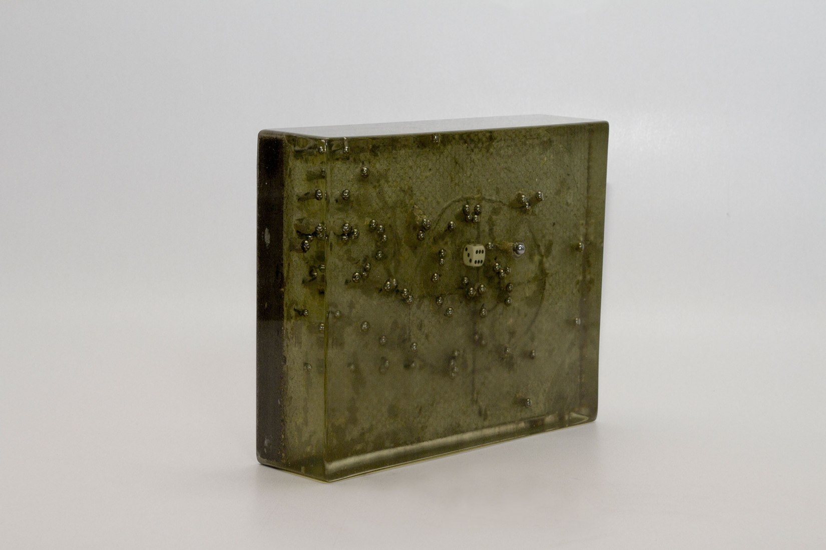 Target 1_2018_concrete, toys_30 x 24 x 8cm. Oliver Czarnetta. Image courtesy of Galería Lucía Mendoza
