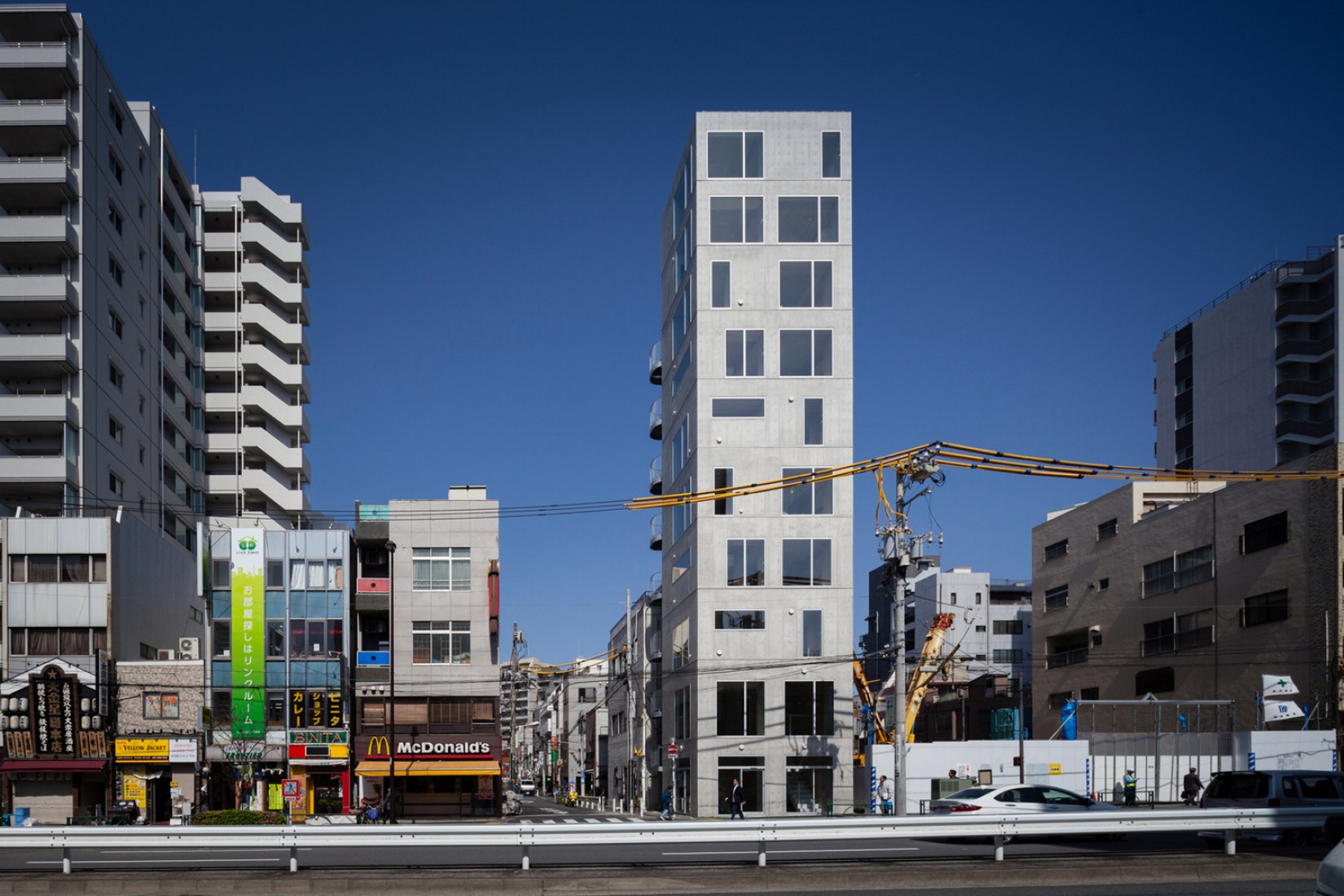 Tatsumi Apartment House by Hiroyuki Ito Architects. Photography © Makoto Yhoshida