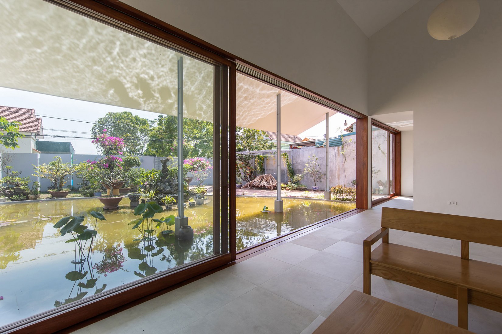 House in Quang Yen by Gia Thang Pham and ngo + pasierbinsk. Photography by Hoang Le.