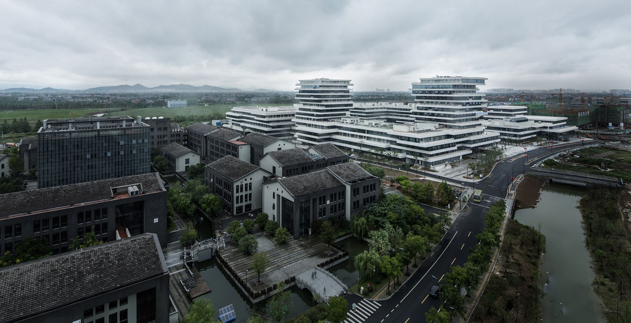 Aerial view. The Campus City for Hangzhou Normal University by WSP ARCHITECTS. Photograph © RUIJING Photography/Zhang Hui