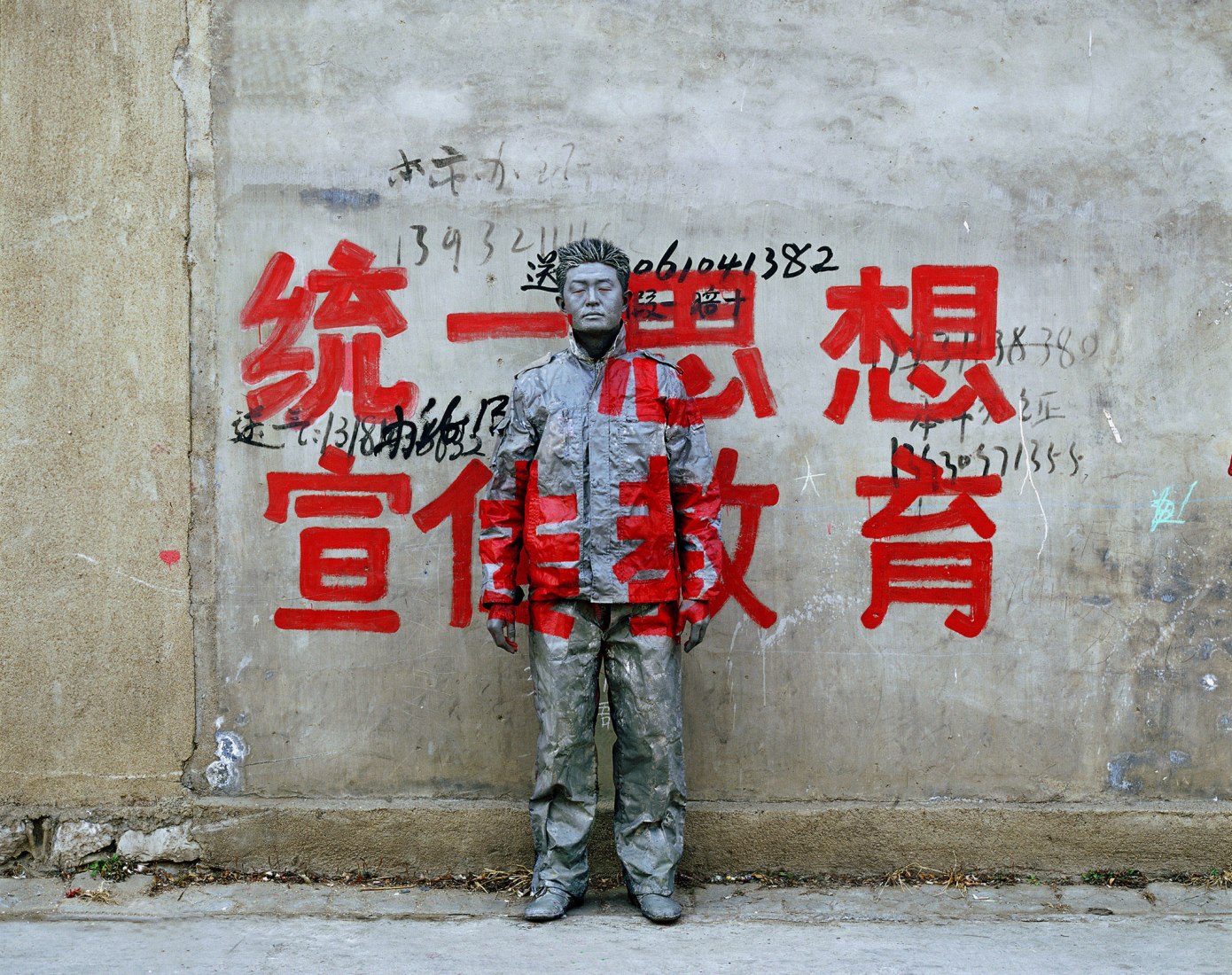 UnitytoPromoteEducation, 2006. The invisible man, Liu Bolin, in the palace of Gaviria. CourtesyBoxart, Verona.