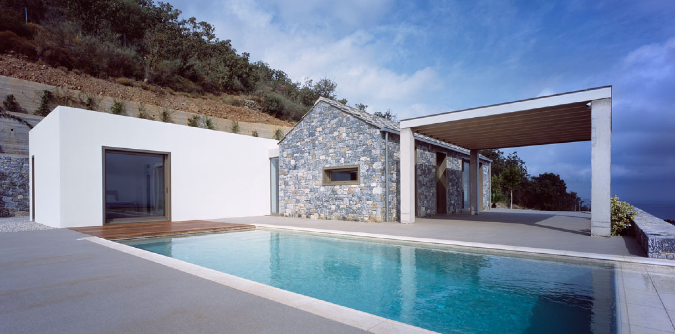 Outside view. Villa Melana by Valia Foufa and Panagiotis Papassotiriou. Photography © Pygmalion Karatzas.