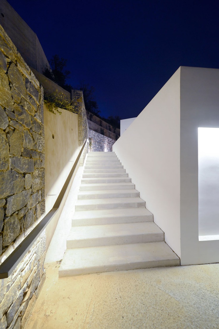 Outside view from the stairs. Villa Melana by Valia Foufa and Panagiotis Papassotiriou. Photography © Pygmalion Karatzas.
