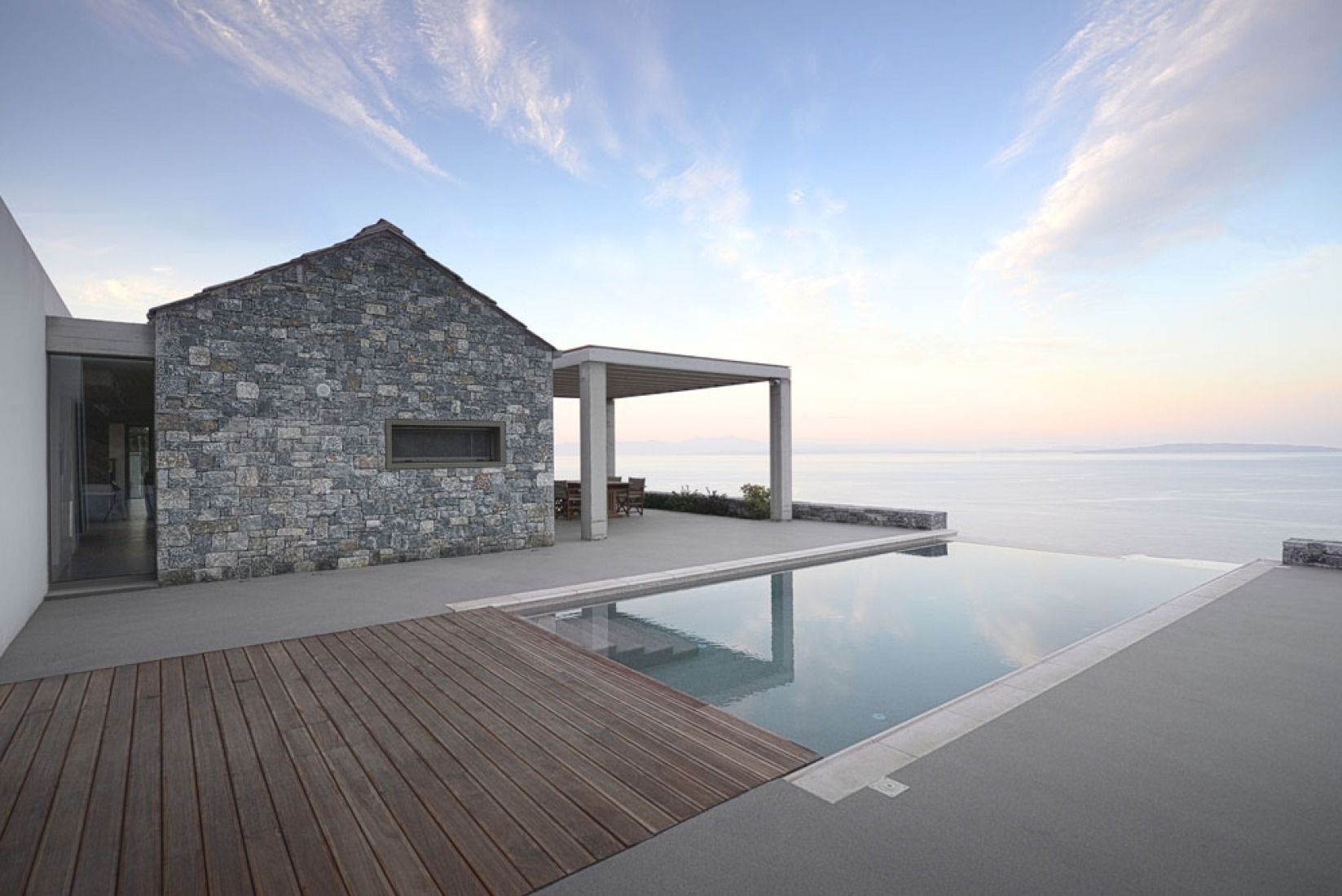 Outside view. Villa Melana by Valia Foufa and Panagiotis Papassotiriou. Photography © Pygmalion Karatzas. 