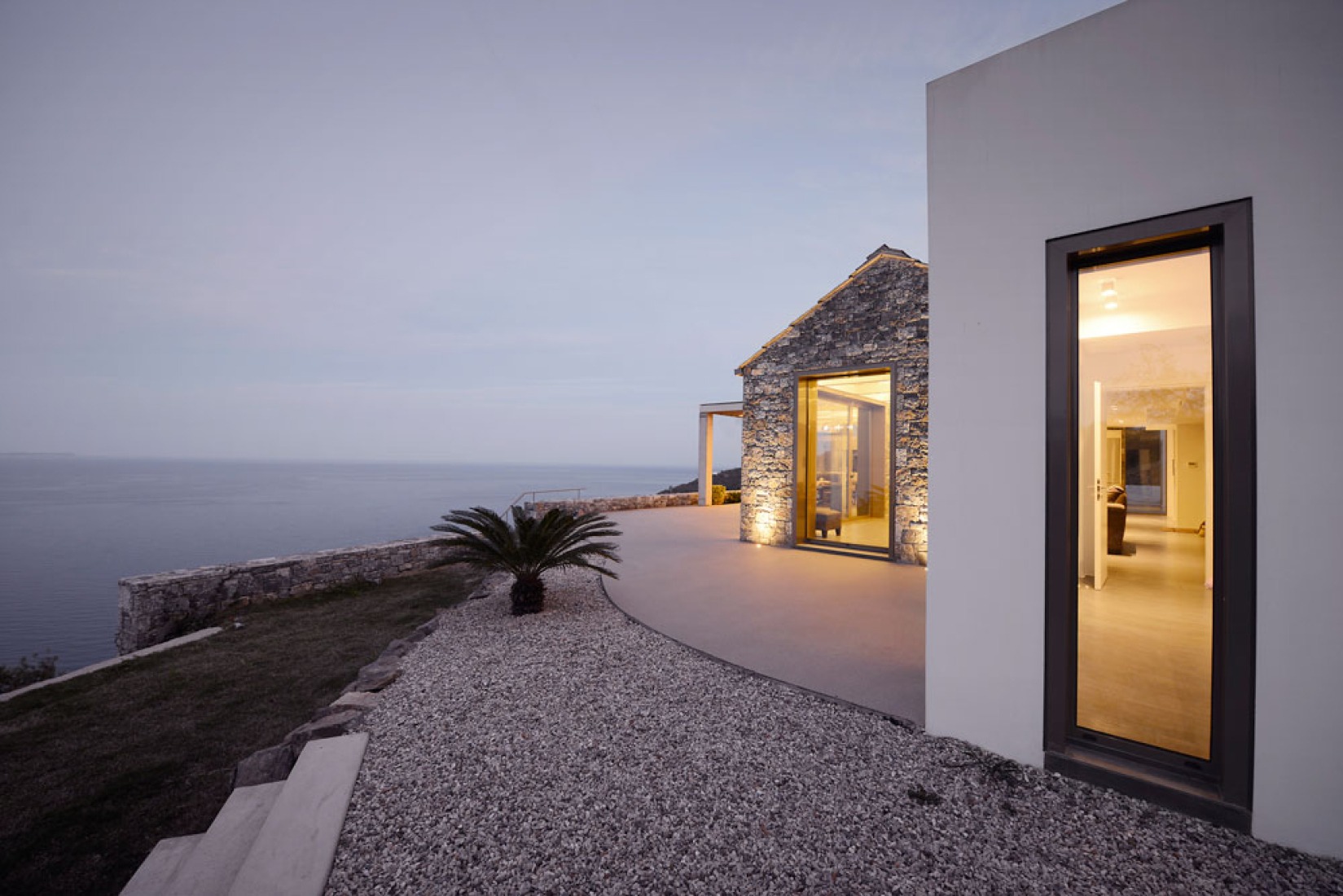 Outside view. Villa Melana by Valia Foufa and Panagiotis Papassotiriou. Photography © Pygmalion Karatzas.